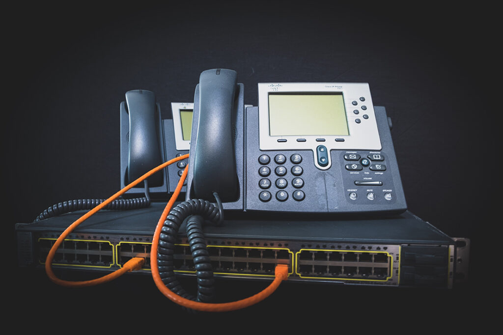 Two phone switch overhead VoIP
